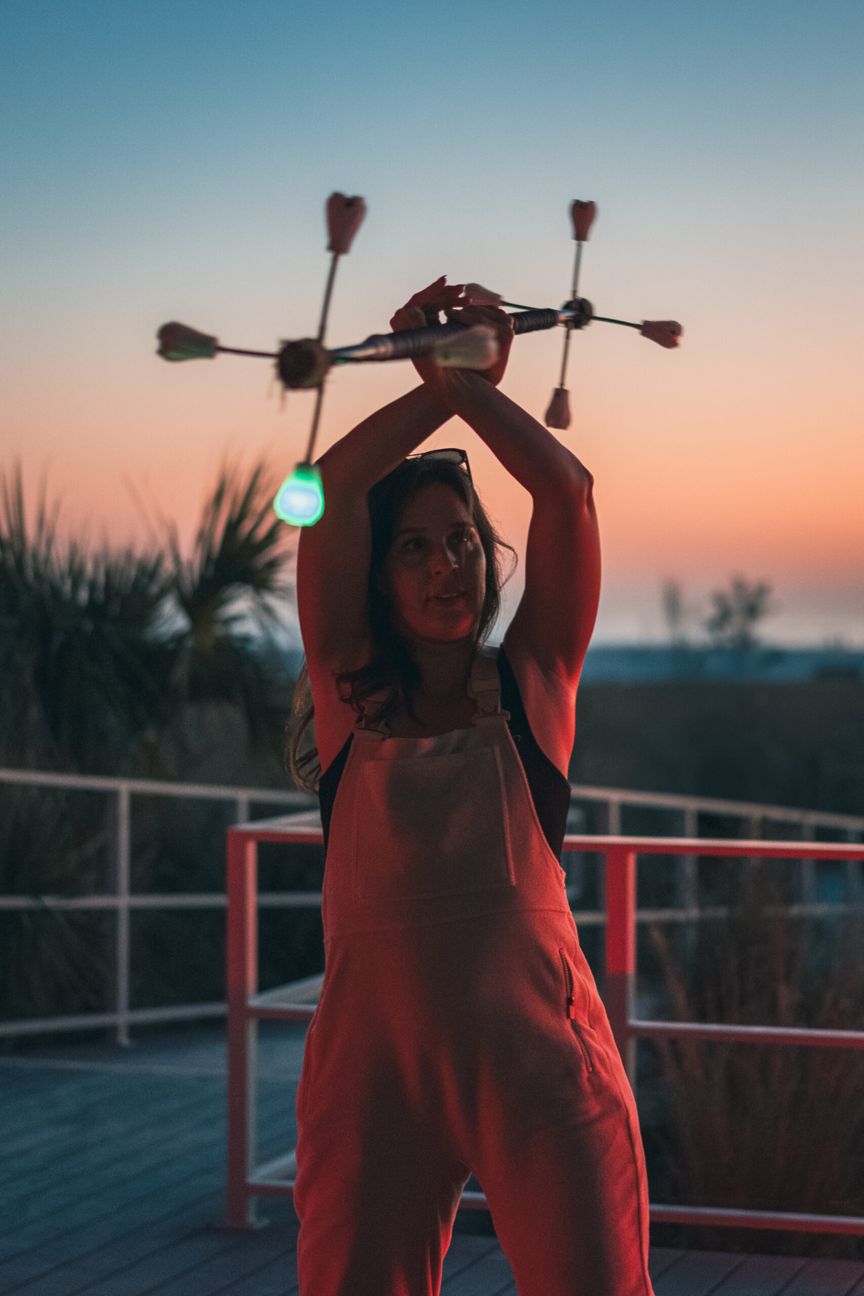 People dancing at sunset