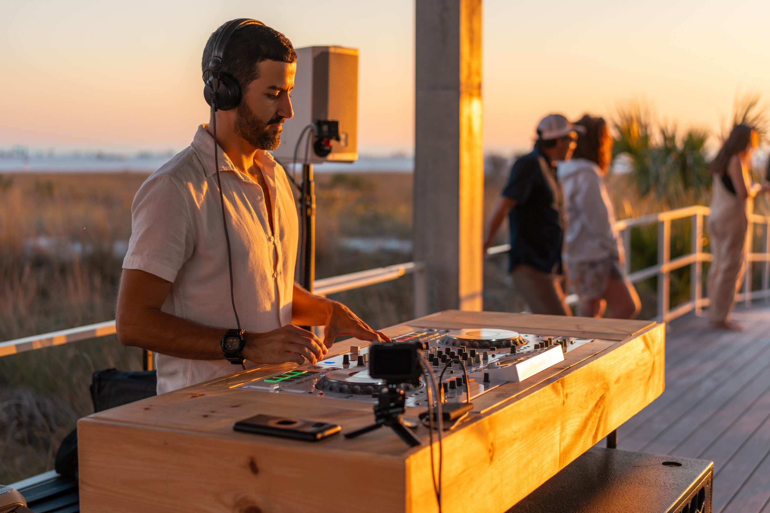 DJ playing a golden-hour set
